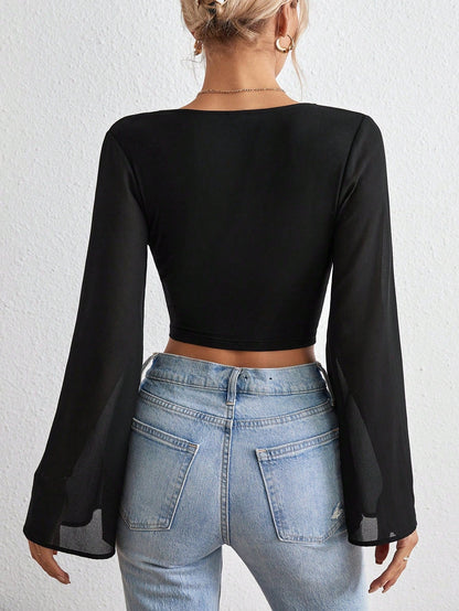 AYRA | Cropped top with wide sleeves and deep neckline 4