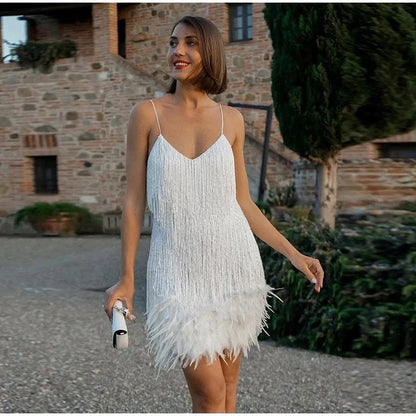 LÉONA | Cocktail dress with sequins and feather accents 1
