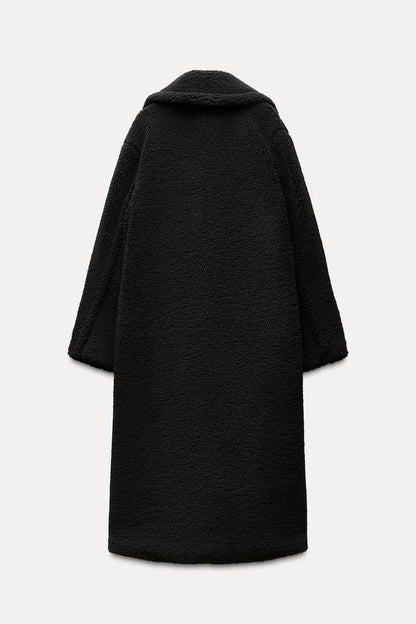 Long Women's Winter Coat Made of Soft Teddy Fabric with Lapel Collar and Side Pockets for Extra Warmth and Comfort 6