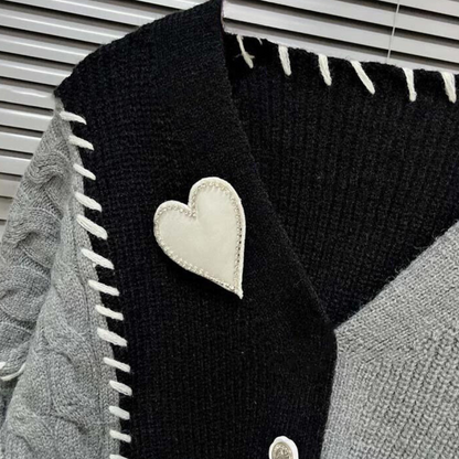 PIXIE | Asymmetrical cardigan with heart appliqué and color accents 2
